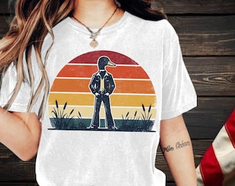 Imagem PNG de um pato-real retrô ao pôr do sol | Clipart para sublimação com estampa de terno de lazer dos anos 70 (arquivo digital)