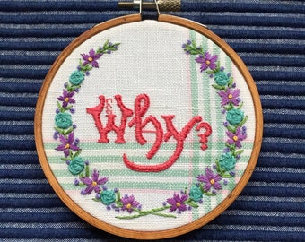 Embroidery hoop, vintage font Why? with flowers