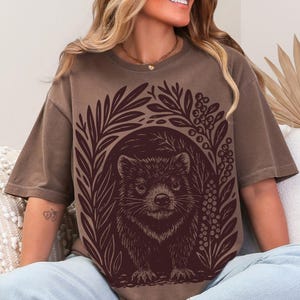 Comfort Colors unisex t-shirt with linocut-style Tasmanian Devil illustration, vintage garment-dyed cotton tee with earthy foliage design