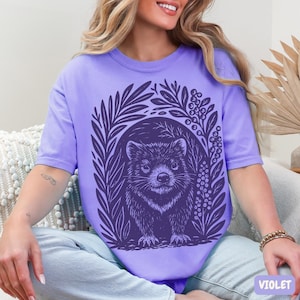 Tasmanian Devil graphic t-shirt in linocut block print style, rustic wildlife illustration on Comfort Colors garment-dyed tee
