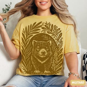 Tasmanian Devil graphic t-shirt in linocut block print style, rustic wildlife illustration on Comfort Colors garment-dyed tee
