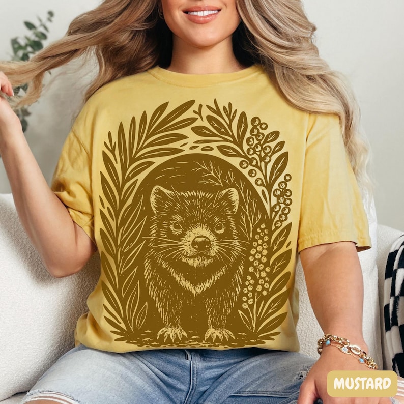 Tasmanian Devil graphic t-shirt in linocut block print style, rustic wildlife illustration on Comfort Colors garment-dyed tee