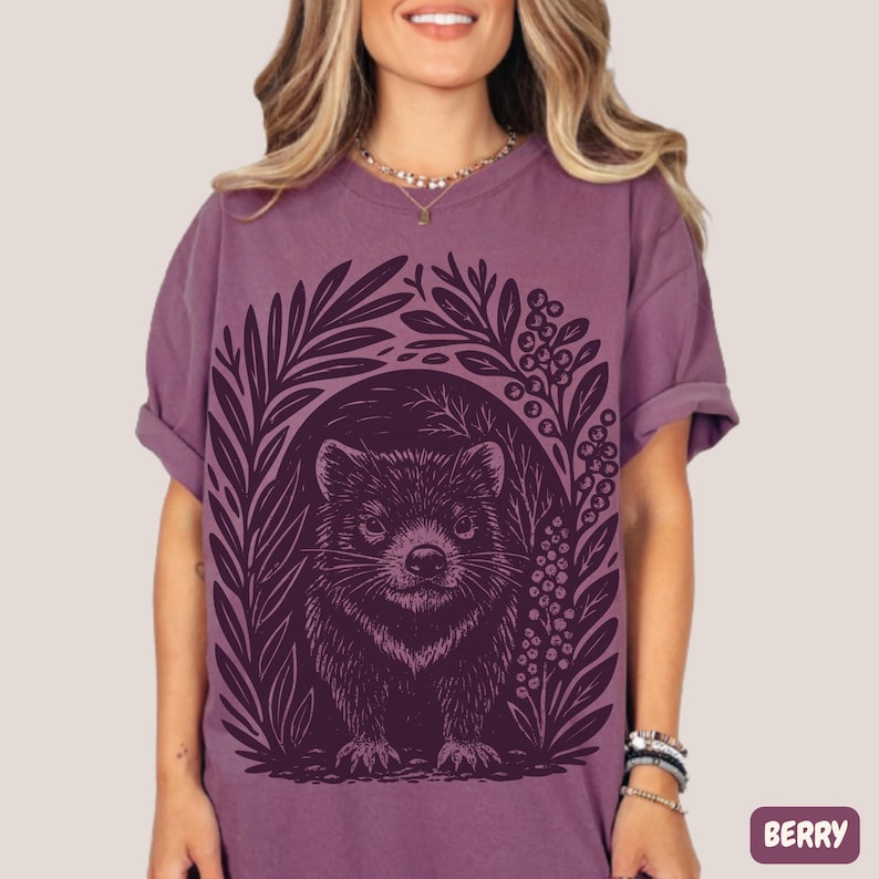 Hand-carved linocut Tasmanian Devil illustration with stylized foliage, minimalist wildlife art printed on cotton t-shirt