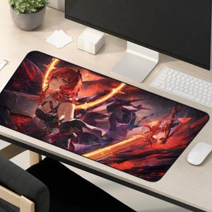 May include: A rectangular mousepad featuring a vibrant anime-style illustration. The artwork showcases a female character with red hair, set against a fiery red and orange background. The mousepad is on a light-colored desk with a computer and accessories.