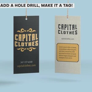 May include: Two rectangular hanging tags. The left tag is black with gold text reading CAPITAL CLOTHES, a phone number, and a website. The right tag is off-white with black text reading CAPITAL CLOTHES, a website, and a gold box with placeholder text.