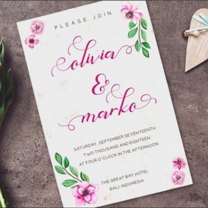 May include: A rectangular wedding invitation card featuring pink watercolor flowers and green leaves. The text reads: PLEASE JOIN, Olivia & marko, SATURDAY, SEPTEMBER SEVENTEENTH, TWO THOUSAND AND EIGHTEEN, AT FOUR O'CLOCK IN THE AFTERNOON, THE GREAT BAY HOTEL, BALI, INDONESIA.