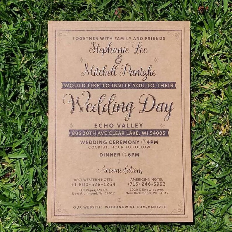 May include: A rectangular wedding invitation on a bed of green grass. The invitation is tan with dark brown text, including the names Stephanie Lee and Mitchell Pantzke, and details for the wedding ceremony and reception.