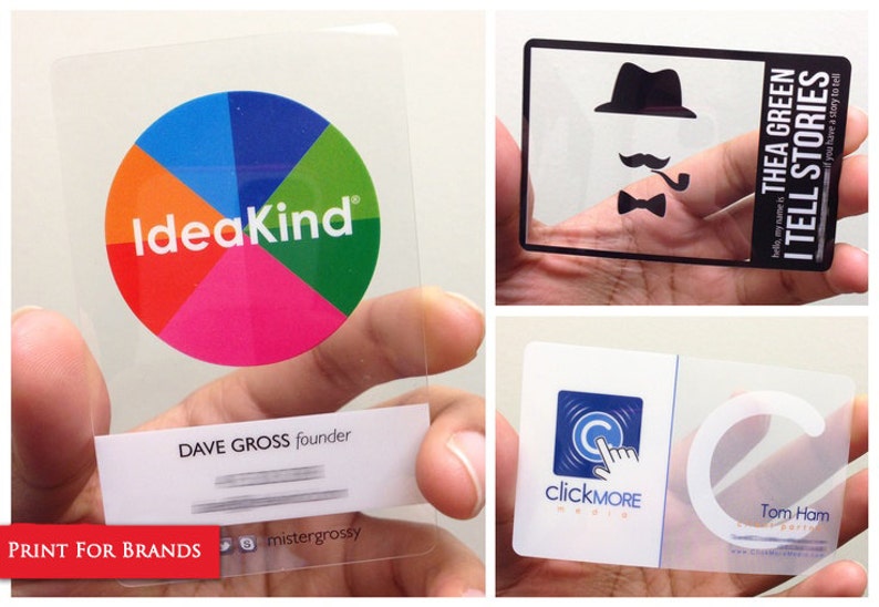 Puede incluir: Tres tarjetas de visita rectangulares de pl&aacute;stico transparente. Una presenta un logotipo circular colorido con el texto IdeaKind y Dave Gross founder. Otra muestra una silueta negra de sombrero, bigote y pipa con el texto Thea Green I Tell Stories. La tercera muestra un logotipo azul con el texto clickMore Media y Tom Ham.