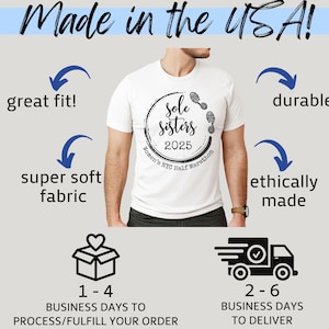 May include: White t-shirt with a black and white graphic design that says "Sole Sisters 2025 Women's NYC Half Marathon". The shirt is made in the USA and is described as having a great fit, being super soft, durable, and ethically made.