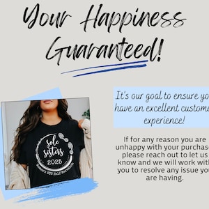 May include: A black t-shirt with a white design that says "Sole Sisters 2025 Komen's NYC Half Marathon". The design includes a circle with footprints around it.