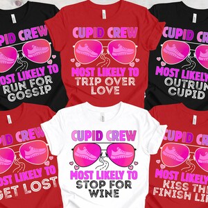 May include: A collection of t-shirts in various colors, including black, red, and white. Each shirt features the text "Cupid Crew" and a graphic of sunglasses with running shoes. The shirts also have phrases like "Most Likely to Run for Gossip."