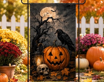 May include: A rectangular garden flag featuring a dark Halloween scene with a full moon, a bare tree, a black raven perched on a carved jack-o'-lantern, a skull, and a lit lantern, all set against a backdrop of scattered autumn leaves.
