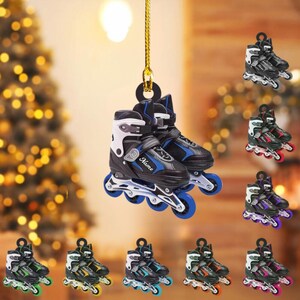 May include: A pair of black and blue inline skates with white accents and blue wheels are suspended from a gold string. The skates have the word "Name" on the side. Several other pairs of skates in different colors are also visible.