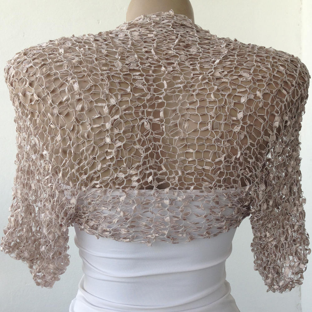 mother of the bride shrugs and boleros