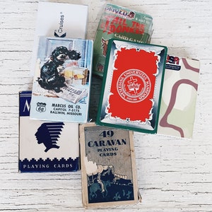 Barajas de cartas vintage: Tail the burkey celebrity cruises, Marcus oil Co. Mohawk, caravana, Wesleiana universitas kansensis, Iraqi most