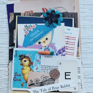 May include: A collage of vintage paper ephemera with a blue and black flower embellishment. The collage includes images of baby chicks, a rabbit, and a card with the text "COUSINS JUST PEEPING OUT".