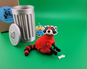 Red Trash Panda in a Trash Can