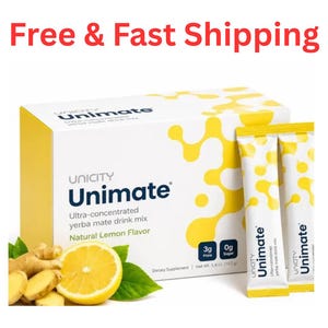 May include: A white and yellow box of Unicity Unimate ultra-concentrated yerba mate drink mix in natural lemon flavor, accompanied by two matching sachets, a sliced lemon, and ginger root, with a net weight of 5.4 oz printed on the box.