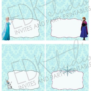 May include: Four printable place cards featuring a light blue background with a white damask pattern. Each card has a white border with a silver glitter effect and a pink inner border. The top left card features a cartoon image of Elsa from Frozen. The top right card features a cartoon image of Anna from Frozen. The bottom left card features a cartoon image of Olaf from Frozen. The bottom right card features a snowflake design. The text "EDK Studio Invites and Party Printables" is visible on the top left and bottom left cards.