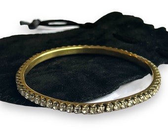 Vintage c. 1920s or earlier metal bangle bracelet with channel set diamanté paste