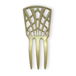 Antique to vintage early 20c cream or ivory coloured celluloid pierced work design decorative hair comb or backcomb