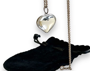 Vintage c. 1970s rock crystal heart shaped pendant on nice silver belcher chain