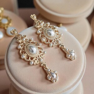 Orecchini pendenti con occhio di tigre: argento sterling