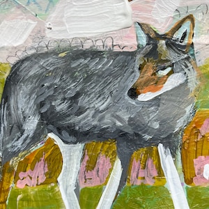 Acrílico enmarcado, técnica mixta sobre papel “Caminando a través de” un coyote