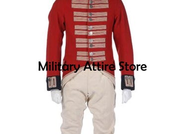 May include: A red military-style jacket with gold-colored braided trim, silver buttons, and dark blue cuffs, paired with off-white trousers. The jacket features epaulettes on the shoulders and the text Military Attire Store is visible.