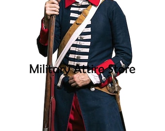 May include: A dark blue military coat with red collar and cuffs, featuring white horizontal chest trim and silver buttons. A tan leather cross-belt is worn over the coat, which is paired with red trousers. A long wooden musket is held upright.