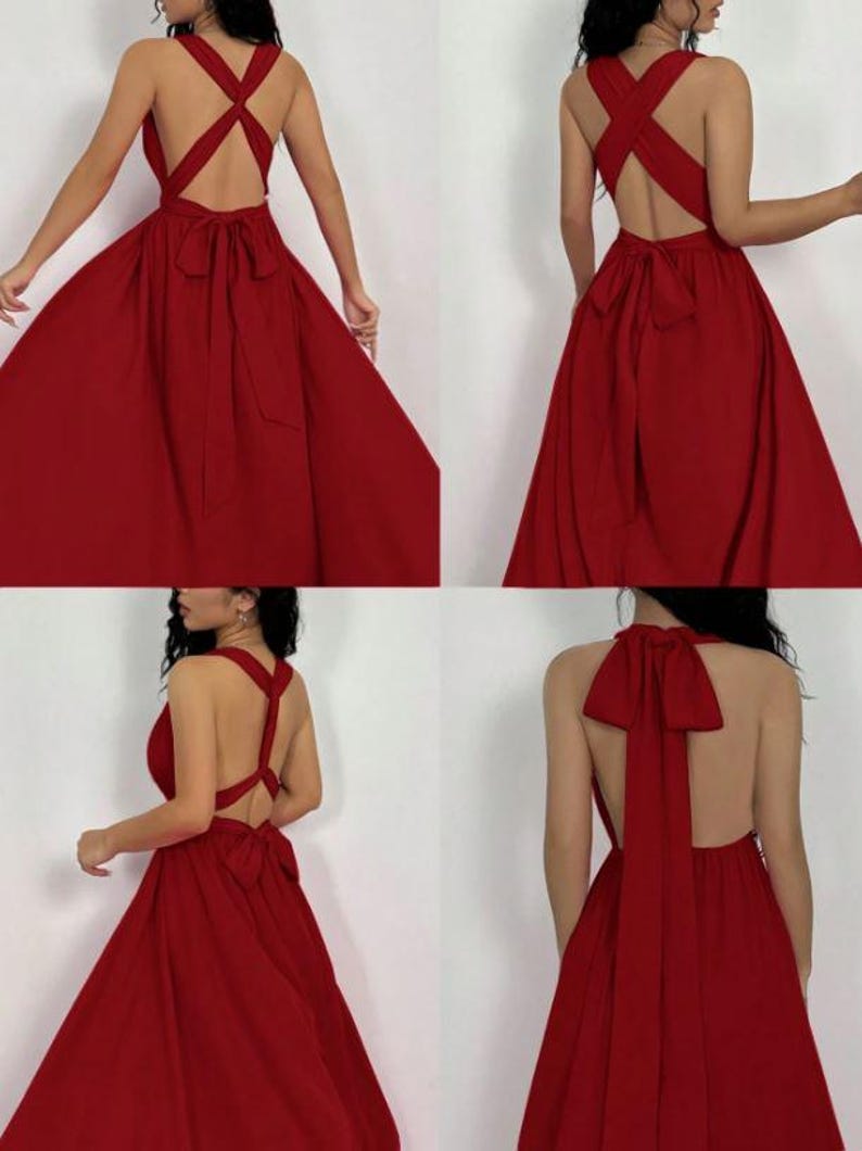 Pu&ograve; includere: Un abito lungo, rosso cremisi, con scollatura all'americana e schiena scoperta. L'abito presenta un design a cinturini incrociati e un grande fiocco nella parte bassa della schiena. La gonna si allarga dalla vita.
