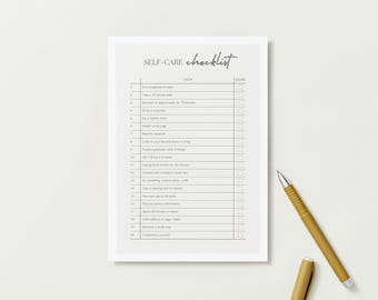 May include: A self-care checklist with a light beige background and a white border. The checklist includes tasks such as drinking water, journaling, and practicing gratitude. A gold pen rests on the surface next to the checklist.