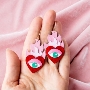 Hearts on Fire Flaming Heart Evil Eye Statement Earrings in Red / Pink image 1