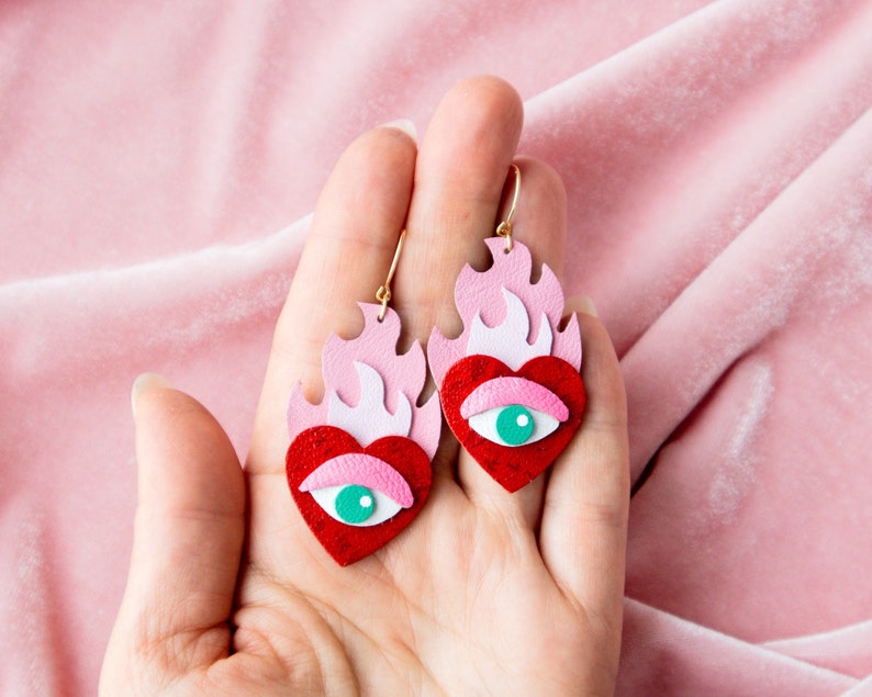 Hearts on Fire Flaming Heart Evil Eye Statement Earrings in Red / Pink image 1