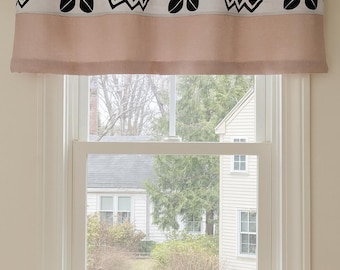 Blush pink Grommet valance 52W x 16" H  with black and white African mud cloth print trim.