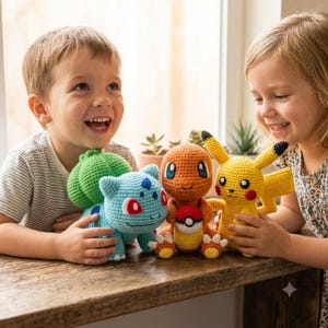 May include: Three handmade crochet plush toys featuring a light blue Bulbasaur with a green bulb, an orange Charmander holding a red and white Poké Ball, and a yellow Pikachu with black-tipped ears and red cheeks, all crafted with yarn.