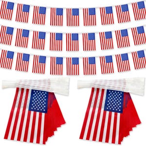 May include: Strings of American flags in red, white, and blue are displayed. The flags are rectangular with red and white stripes and a blue square with white stars. The image also shows folded flag banners.