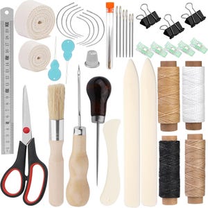 May include: Leather craft tools kit with a variety of tools including needles, thread, awls, a thimble, a brush, scissors, and a ruler.