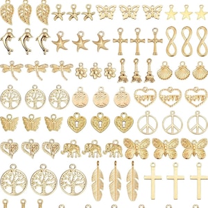 May include: A selection of gold-coloured charms in diverse shapes, such as owls, leaves, butterflies, stars, dolphins, starfish, crosses, dragonflies, flowers, Eiffel Towers, shells, hearts, peace signs, elephants, and tree of life designs. Perfect for jewellery making.