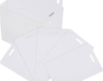 May include: A stack of 100 blank white plastic cards with a hole in the top right corner. The cards are arranged in a fan shape.