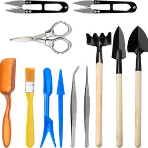 May include: A set of 10 gardening tools, including a pair of scissors, a pair of tweezers, a trowel, a hand rake, a small shovel, a pair of shears, a small brush, a small scoop, a small fork, and a small rake.
