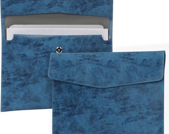 May include: Two blue document holders with a textured finish. One is open, revealing white paper inside, and the other is closed. Both have a snap closure. The holders are made of a material that resembles leather.