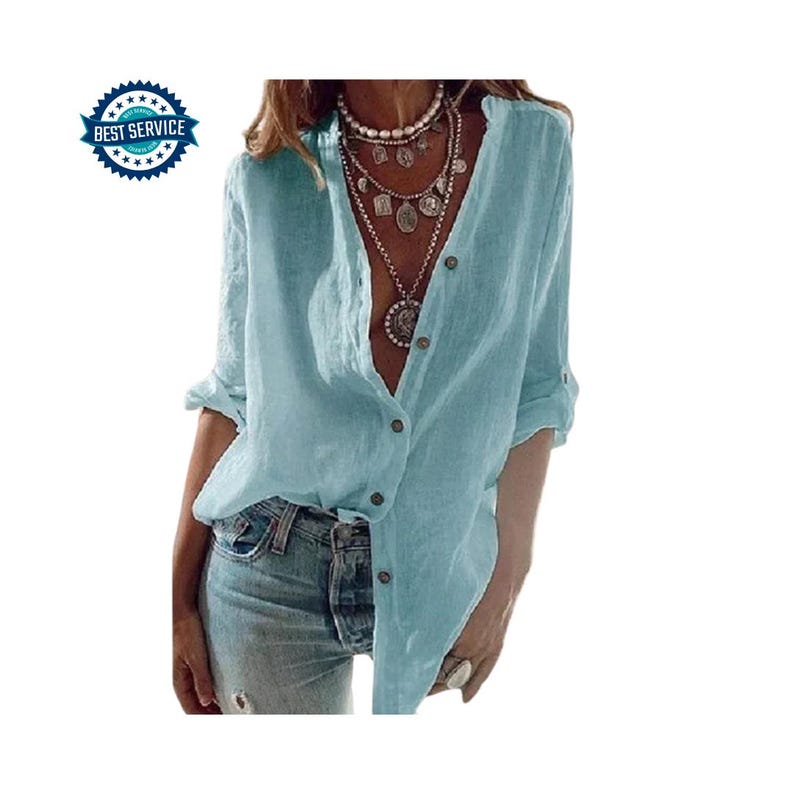 May include: A light blue button-down shirt with long sleeves, rolled up at the elbows. The shirt is paired with light-wash denim jeans. A multi-layered necklace is visible. The image also includes a "Best Service" badge.