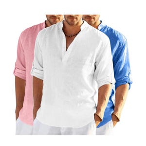 May include: Three linen shirts in pink, white, and blue. Each shirt has a mandarin collar, a V-neck, and long sleeves that are rolled up. The shirts are casual and suitable for warm weather.