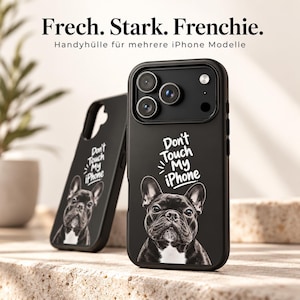 Könnte beinhalten: Zwei schwarze Handyhüllen für iPhone-Modelle mit einer weißen Grafik einer Französischen Bulldogge und dem Text Don't Touch My iPhone. Die Hüllen haben einen Kameraausschnitt und eine matte Oberfläche mit dem Hundegesicht.