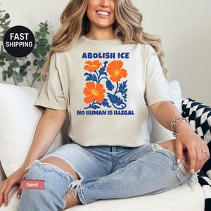 Floral Abolish ICE Human is Illegal Shirt, Political Resistance Shirt, Anti-Trump Activist Wear, No Human is Illegal Top, DACA Shirt