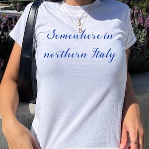 Call Me By Your Name Baby Tee Somewhere In Northern Italy Womens Baby Tee Timothee Chalamet Gift Luca Guadagnino T-Shirt CMBYN Merch