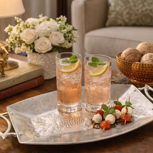 May include: A set of three ceramic mugs with a speckled, matte finish. The mugs are in shades of cream, light gray, and dark gray. Each mug has a simple, modern design and a rounded handle.