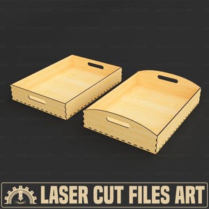 Könnte beinhalten: Zwei hellfarbene Holztabletts mit Griffaussparungen. Eines ist rechteckig, das andere hat eine gebogene Oberkante. Die Tabletts sind vor einem dunklen Hintergrund platziert. Der Text "LASER CUT FILES ART" befindet sich unten.