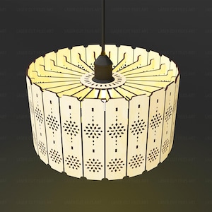 May include: A cylindrical pendant lamp shade constructed from light-colored wood panels. Each panel features a repeating laser-cut geometric star pattern. The shade is suspended by a central black cord and socket assembly, creating a light fixture.
